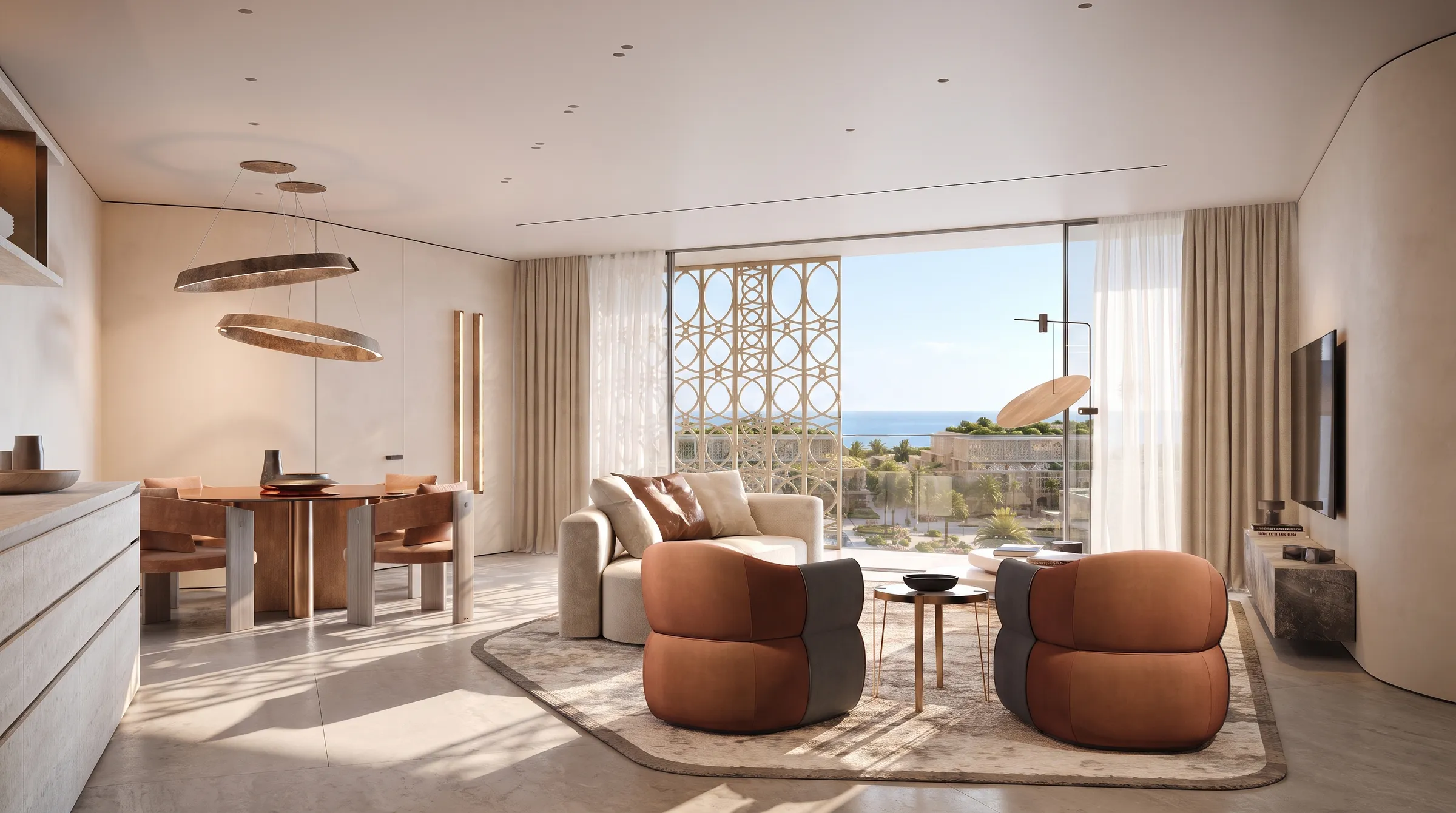 Open living and dining space with a curved sofa, dining table and full-height glazing onto the sea